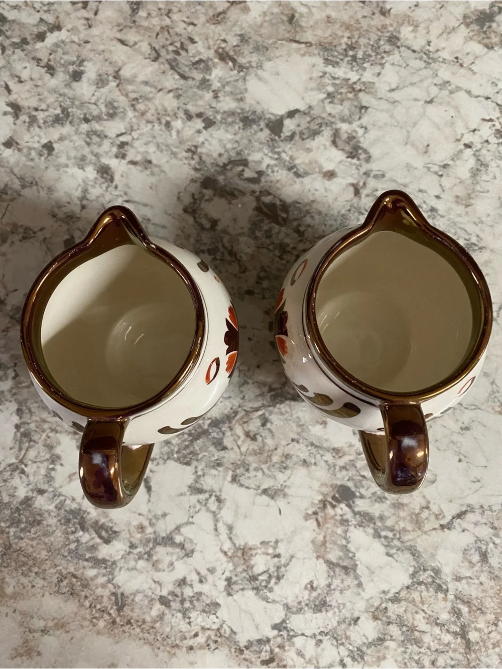 Pair of Cream and Brown Floral Ceramic Creamers with Copper LusterTrim. Vintage